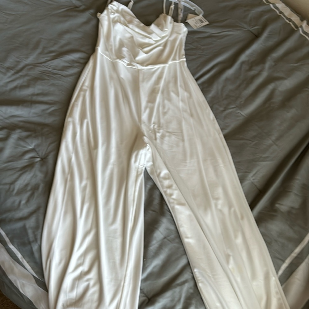 Off white romper.brand new with tags.